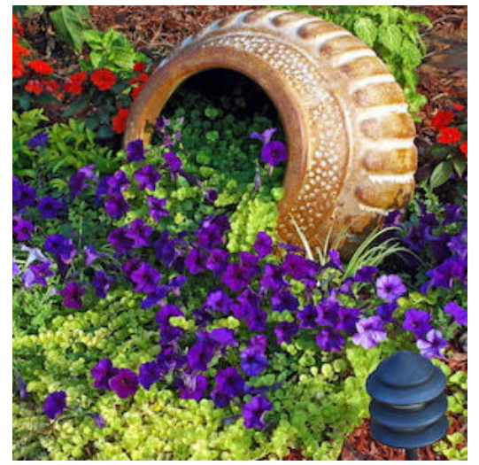 diy--spring--tipped-over-planter--sourceunknown.png